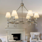 Six-light pleated white shade chandelier in polished nickel
